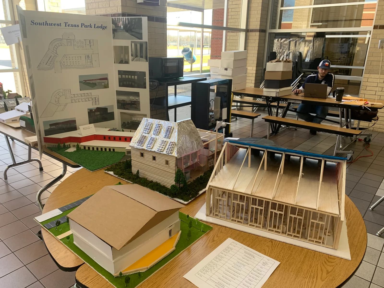 Architectural models and the Southwest Texas Park Lodge display board