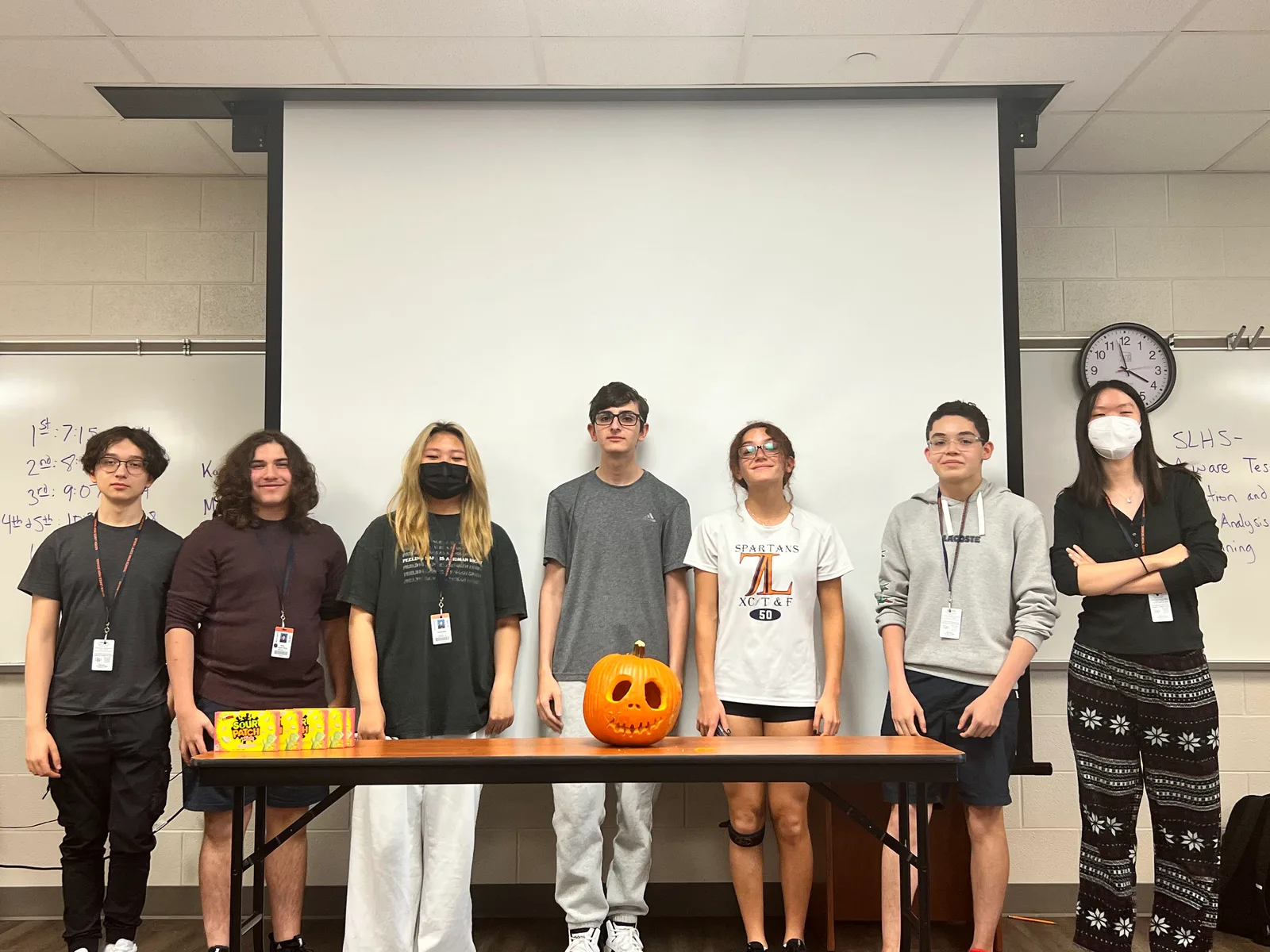 Group photo at the end of the fall social pumpkin contest