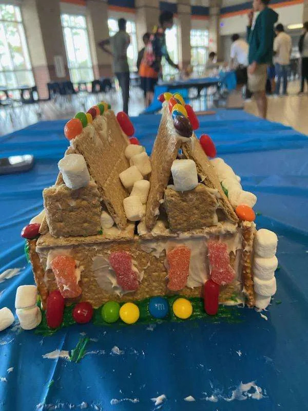 Graham-cracker house decorated with candy and marshmallows