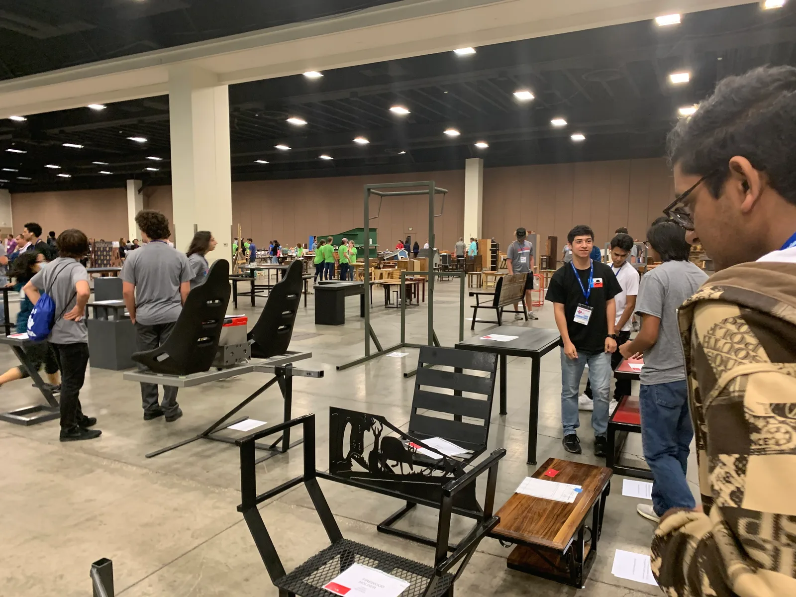 Student-built furniture entries on the expo hall floor